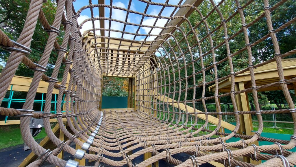 View across the rope net at the new Penlee Play Park